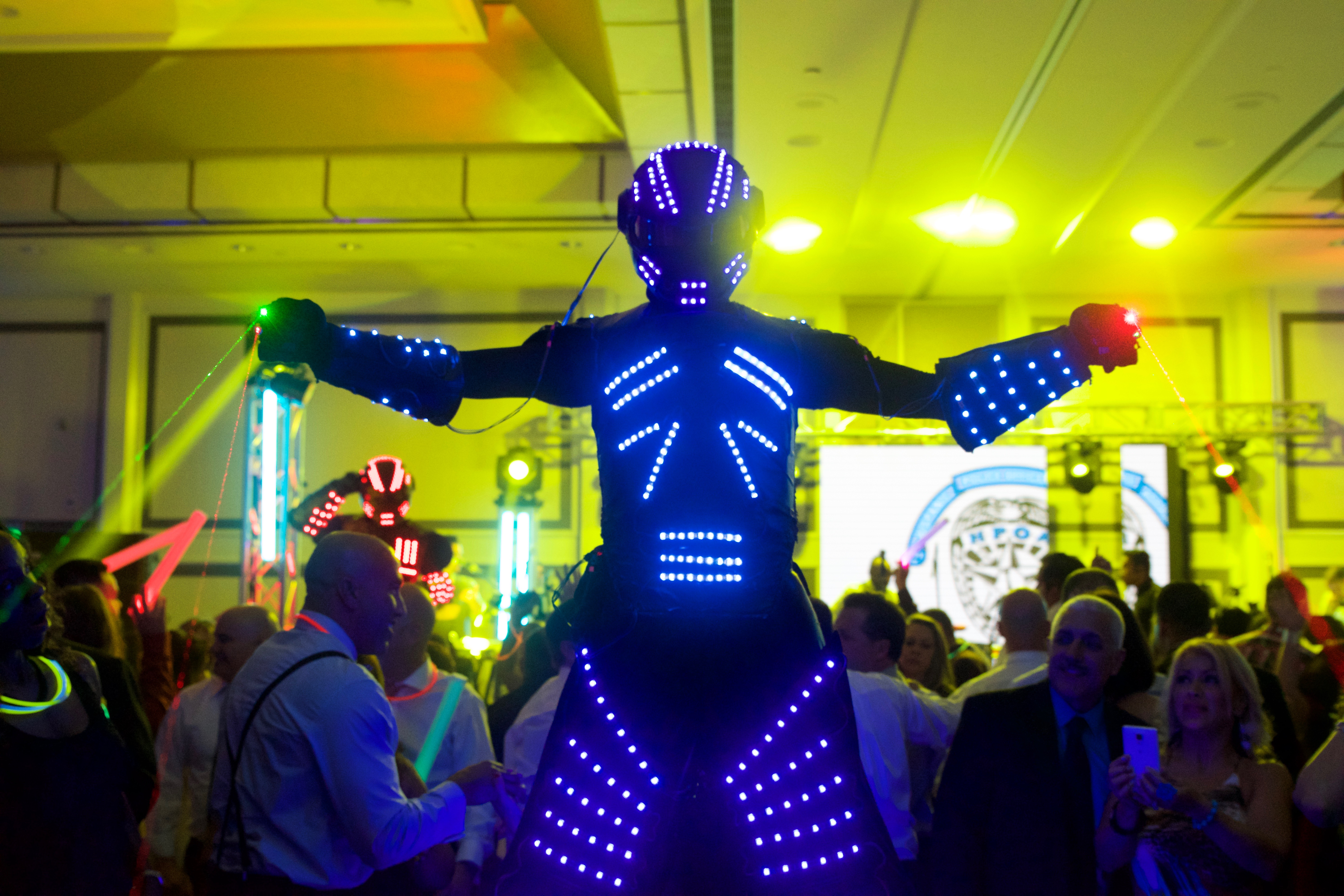 An LED robot makes a big impression, entertaining at a corporate event