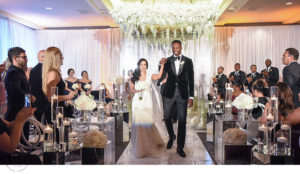 Jeff Green and Stephanie Hurtado walk down the aisle